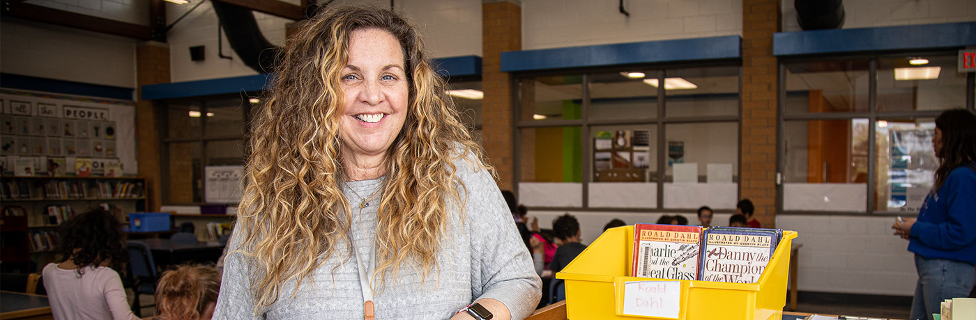 Garton teacher in library